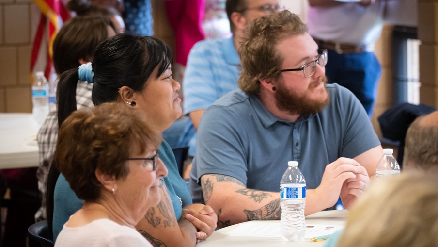 A young couple attends Bible study.