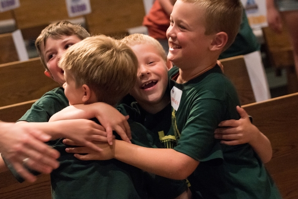 Boys hugging at VBS.