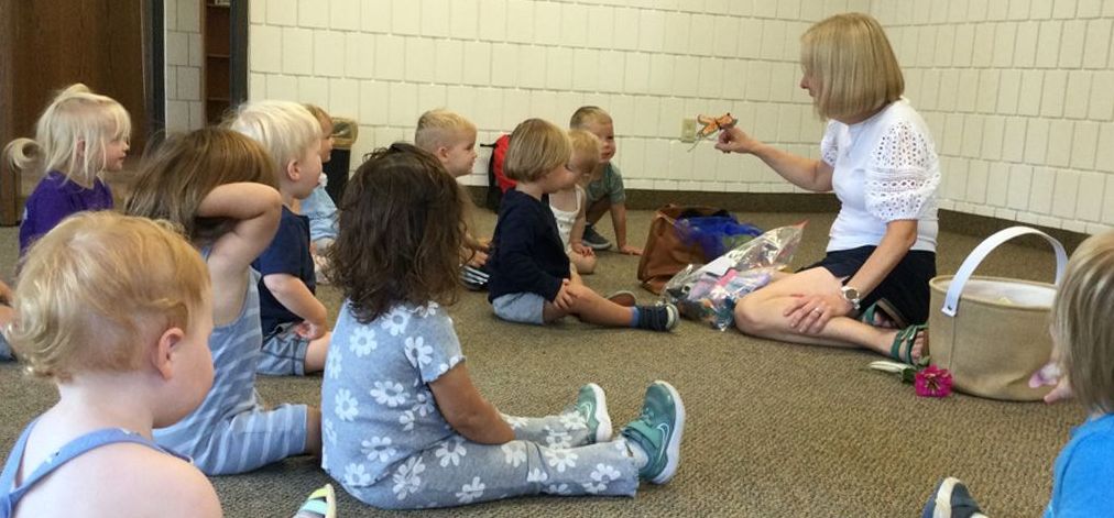 Family connecting with Cross View ECC teacher