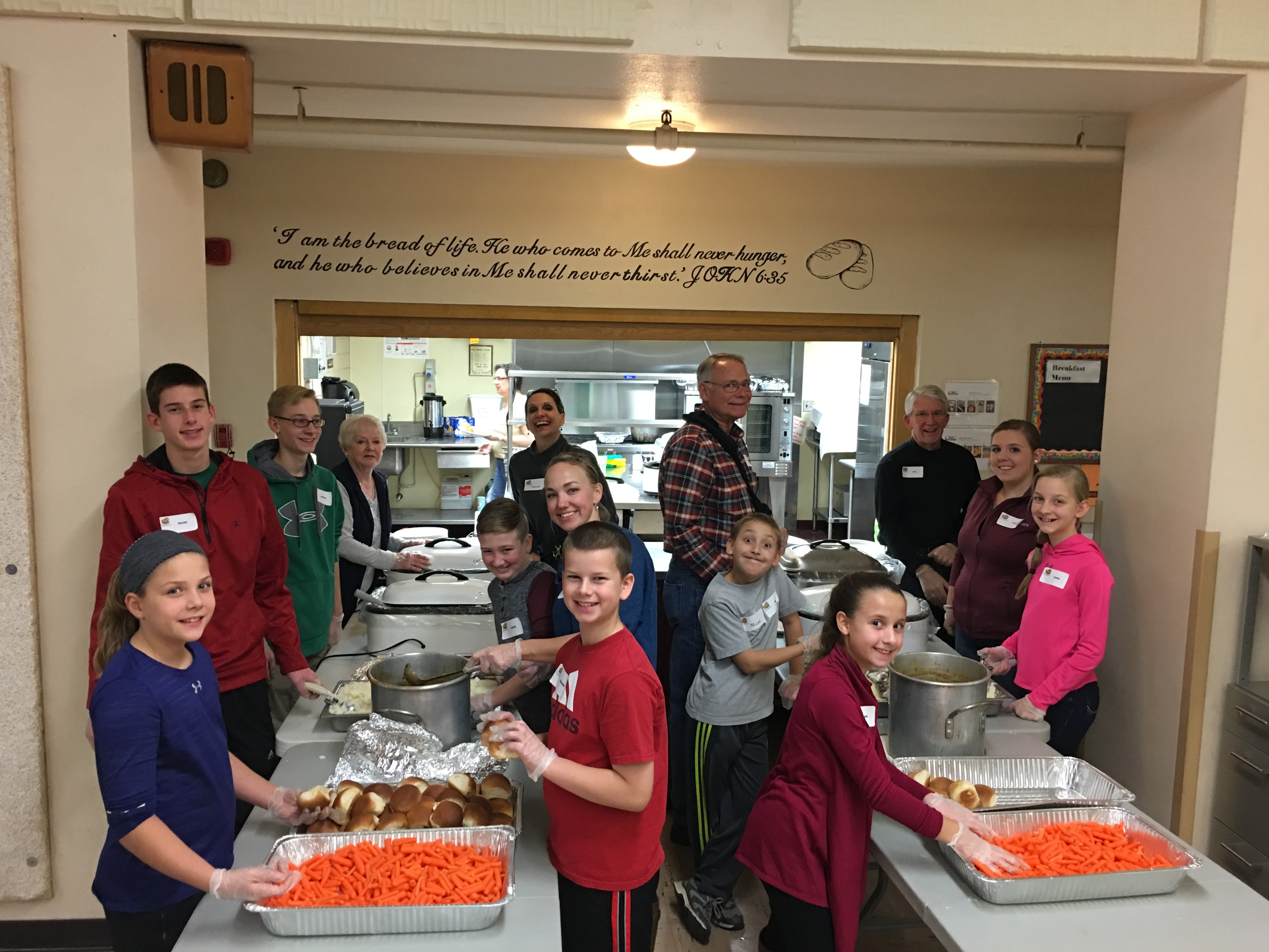 Cross View members prepare to serve the Thanksgiving meal at Trinity First School